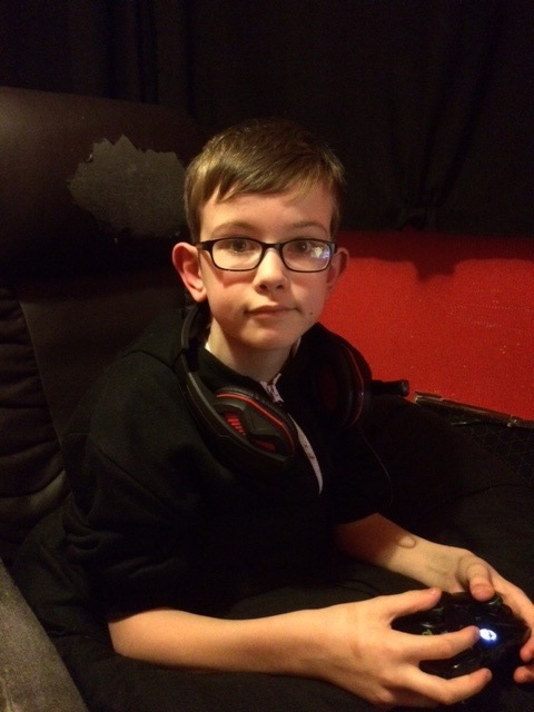 one of Helens kids holding an xbox controller